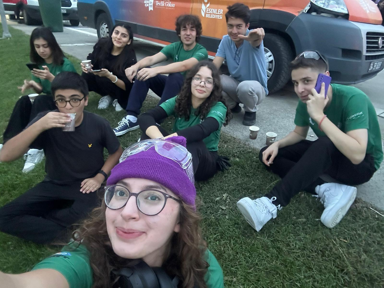 Team members working on a motor